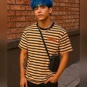 Welcome yellow white and black striped short sleeve shirt Size L